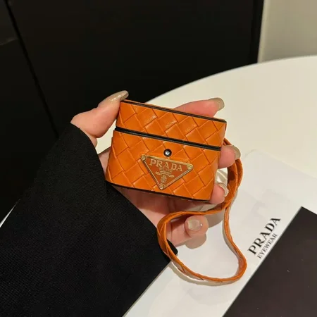Prada - inspired barrel - shaped woven - pattern AirPods case with hand strap