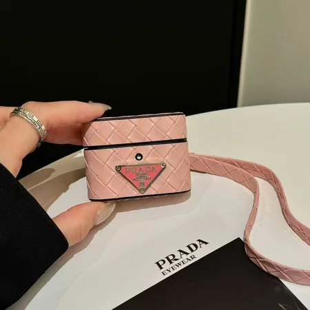 Prada - inspired barrel - shaped woven - pattern AirPods case with hand strap