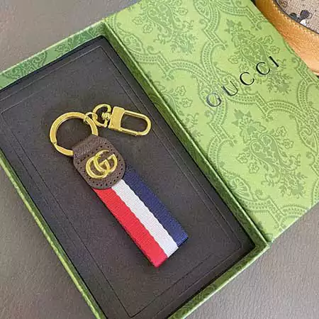 Gucci striped gold - logo hook keychain