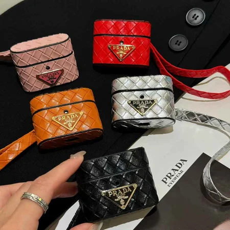 Prada - inspired barrel - shaped woven - pattern AirPods case with hand strap