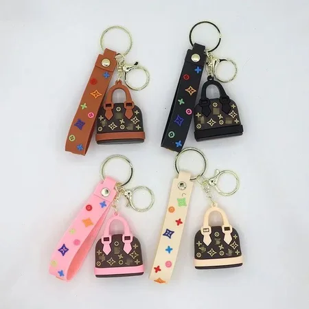 Louis Vuitton mini bag - shaped keychain