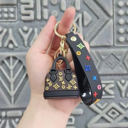 Louis Vuitton mini bag - shaped keychain
