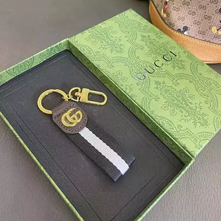 Gucci striped gold - logo hook keychain