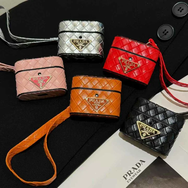 Prada - inspired barrel - shaped woven - pattern AirPods case with hand strap