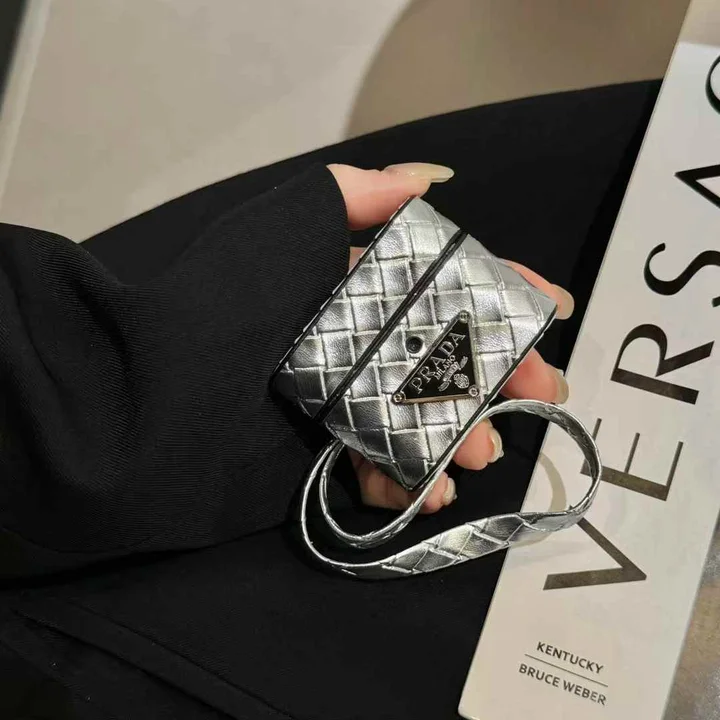 Prada - inspired barrel - shaped woven - pattern AirPods case with hand strap