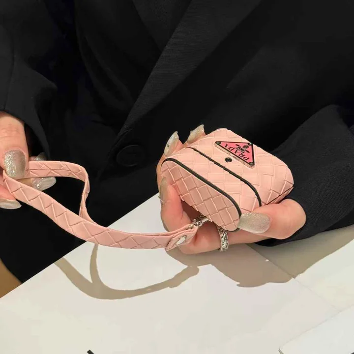 Prada - inspired barrel - shaped woven - pattern AirPods case with hand strap