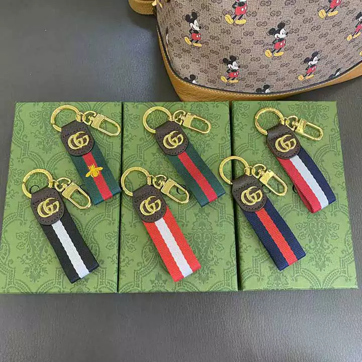 Gucci striped gold - logo hook keychain